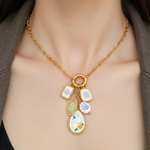 Load image into Gallery viewer, Mirelle Floral Ceramic Pendant Necklace – French Embroidered Style