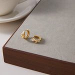 Load image into Gallery viewer, Lily Baguette Zirconia Huggie Hoop Earrings – 18K Gold-Plated Waterproof
