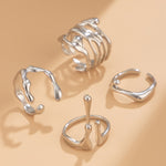 Load image into Gallery viewer, Élise Sculptural 4-Piece Ring Set
