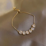Load image into Gallery viewer, Maevy Adjustable Crystal Charm Bracelet  - Gold-Plated
